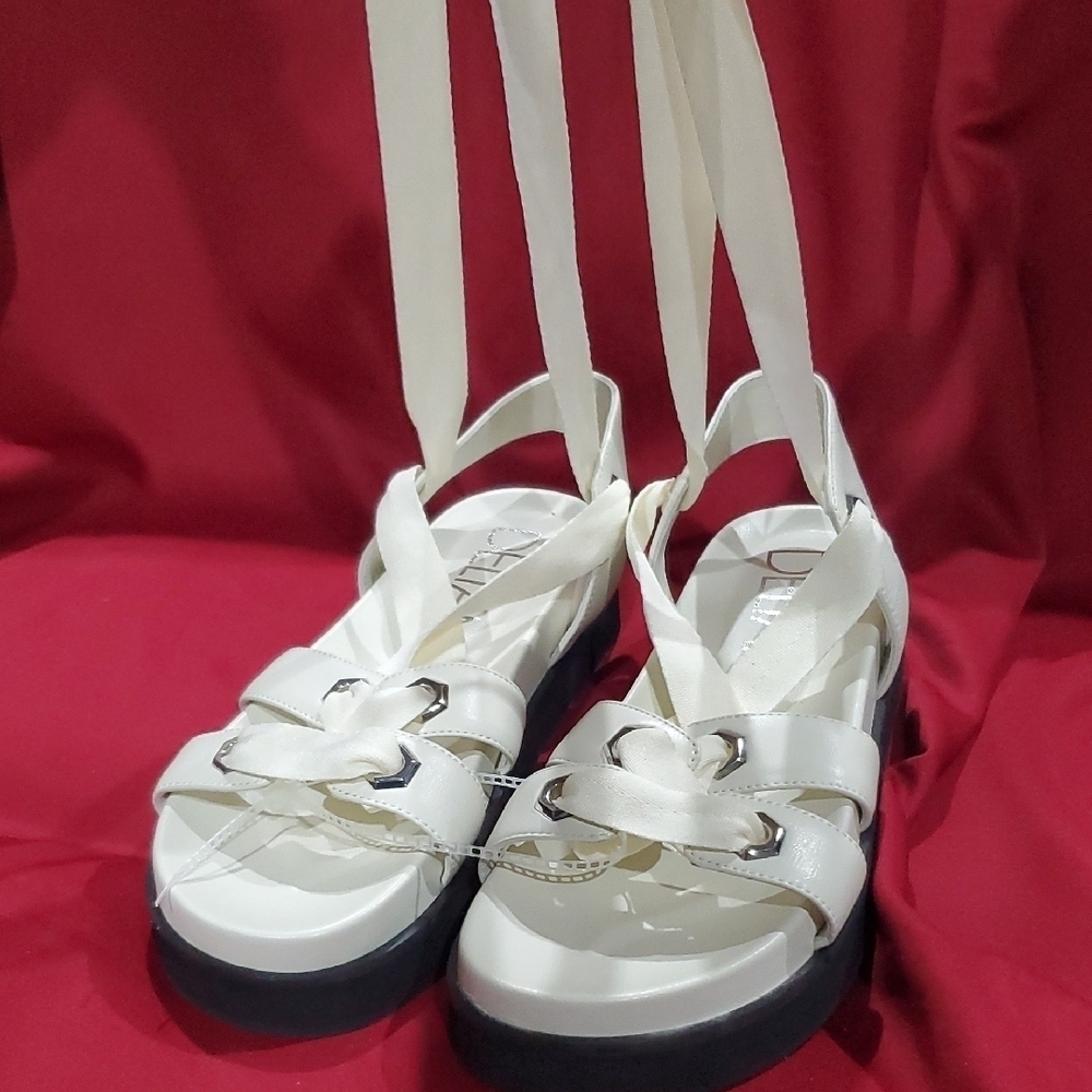 Delta Blayke White Sandals with Crisscross Straps and Dark Sole